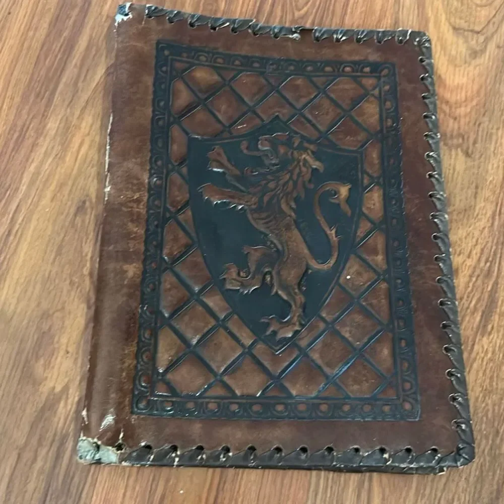 Vintage tooled brown leather lion crest made in Italy book cover
